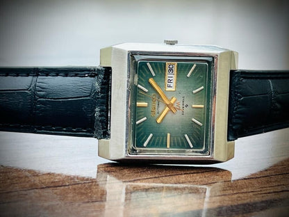 vintage Seiko LM 5606-5160 automatic green dial mens watch, requires service
